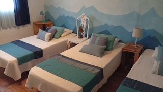 Habitación de tres camas